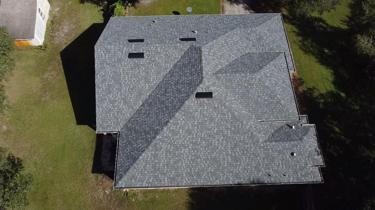 Eustis roof from above, with hips, four box vents and a small shed on the left