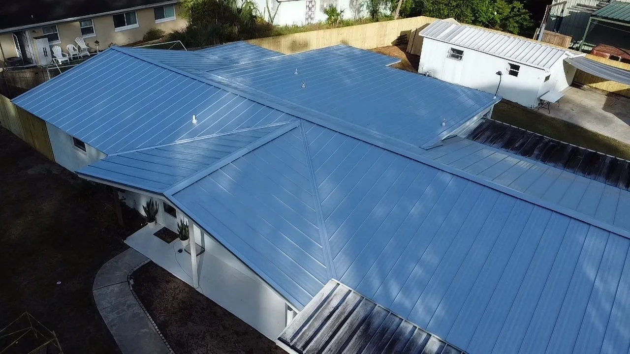 Silver standing seam metal roof photographed from above
