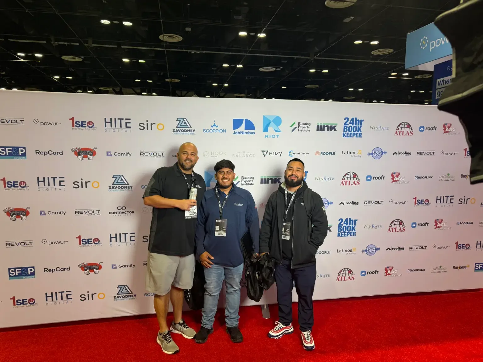Pinnacle Roofing Group team members at a roofing industry event
