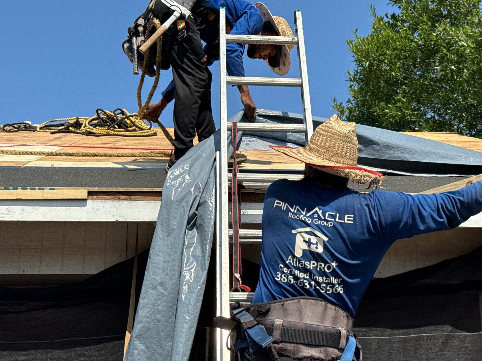 Roofing Crew on Ladder