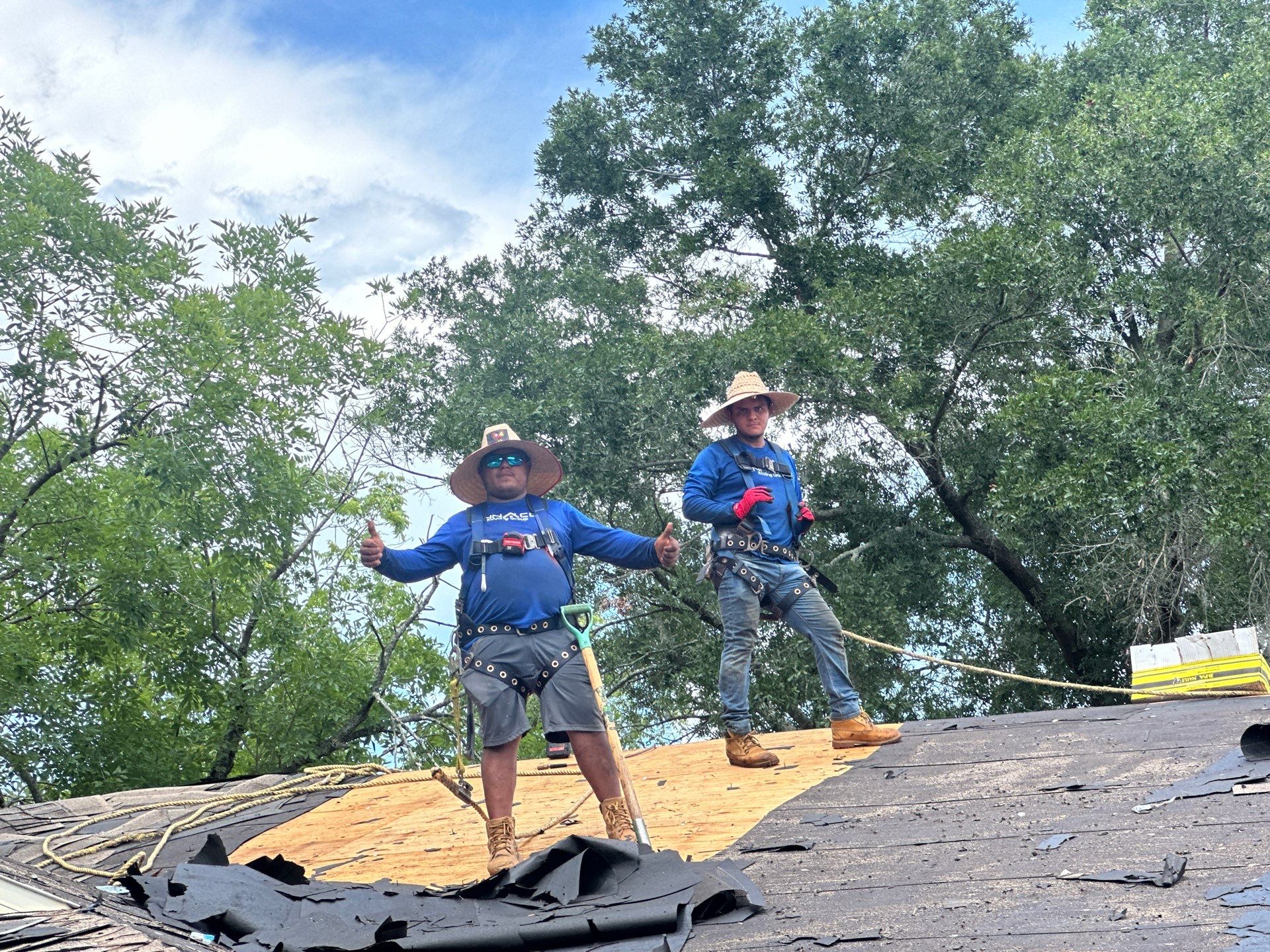 Roofing Crew posing on roof