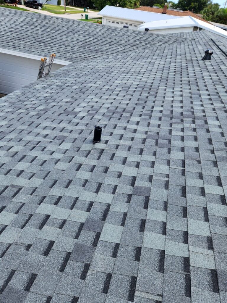 Roof replacement showing improved roof condition after years of limited maintenance and roof repairs.