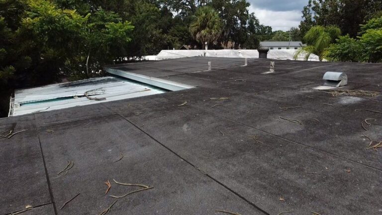 Damaged roof on a Central Florida home needing roof replacement or roof repair.