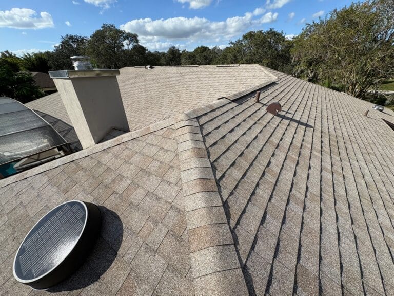 Finished shingle roof after professional roof replacement by local roofers in Central Florida, featuring high-quality architectural shingles and clean ridge lines.